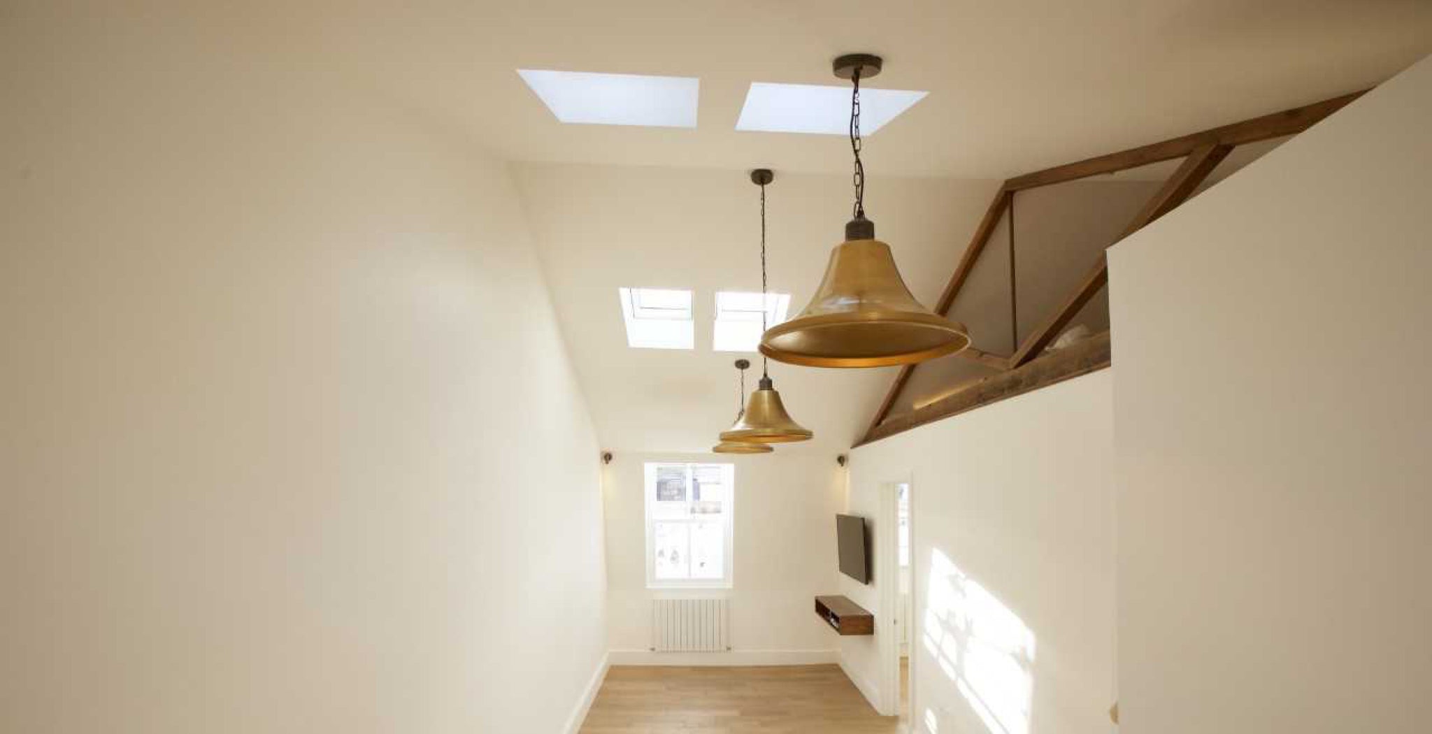 Statement ceiling with brass lights