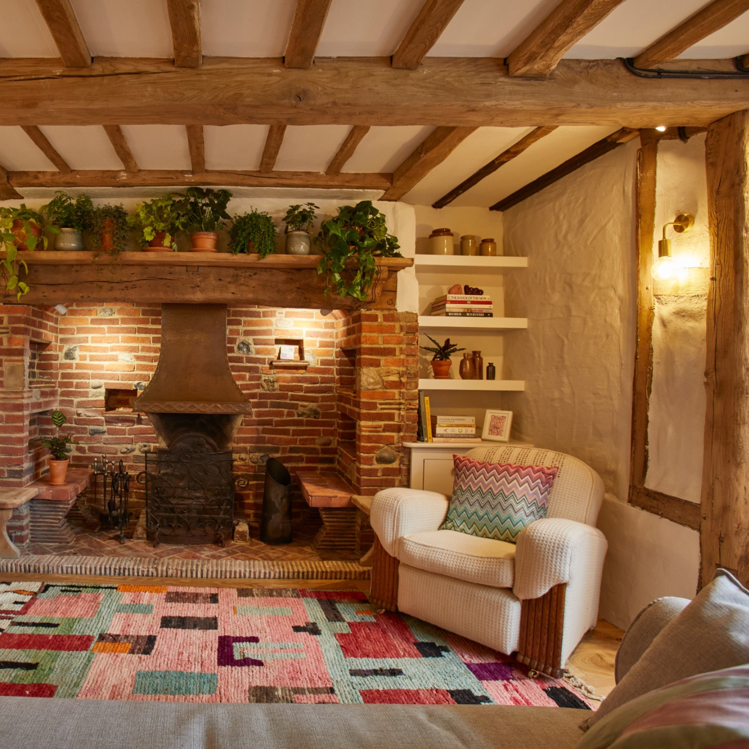 An Edison wall light in a rustic cottage living room