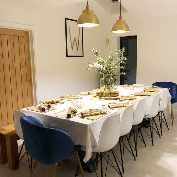 Dining room table with place settings for dinner