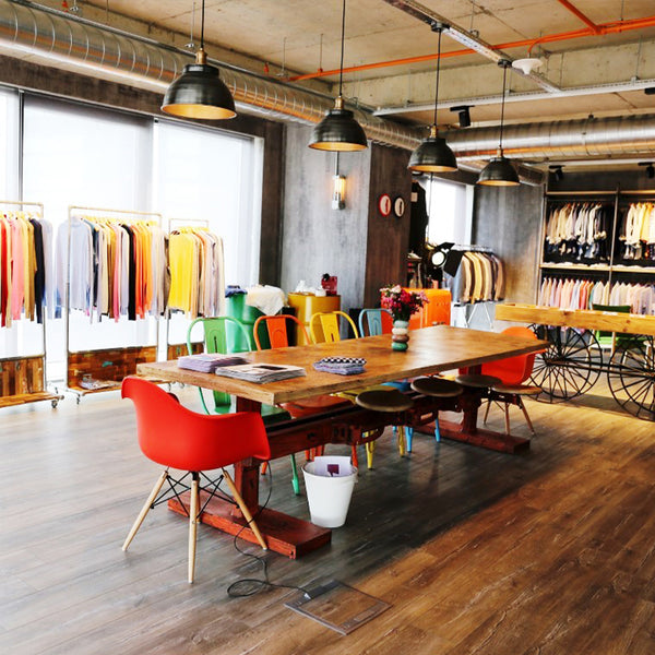 A clothing retailer with industrial features and lighting