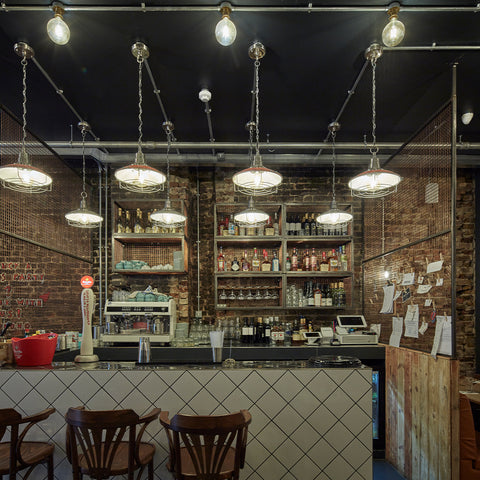 an open factory industrial bar interior