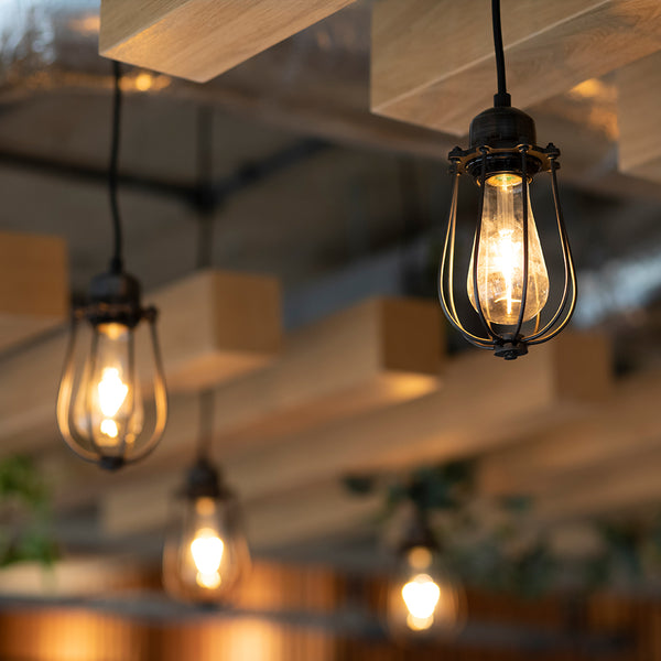 Exposed bulbs in wire cages