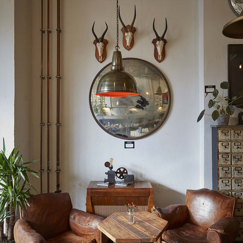 An interior design with mirrors and wall ornaments