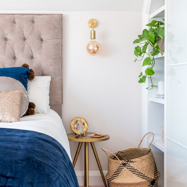 An elegant bedroom interior with vintage wall lights