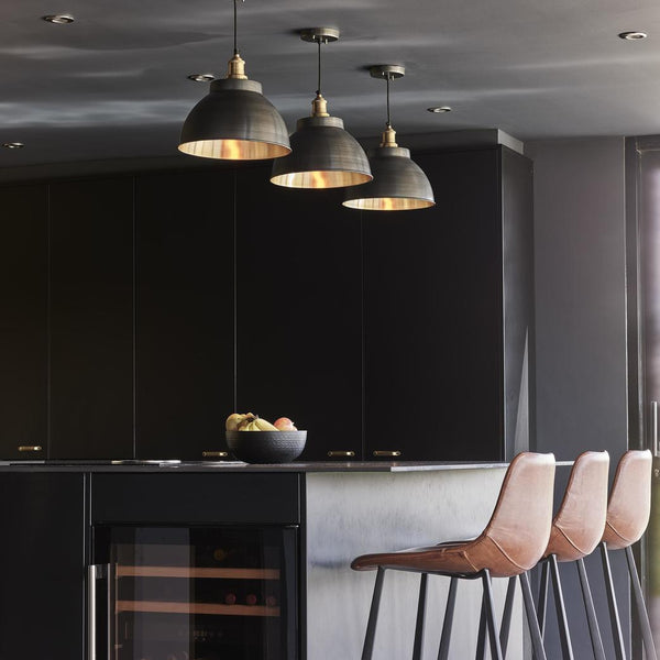 brooklyn dome pendants hanging above open plan kitchen