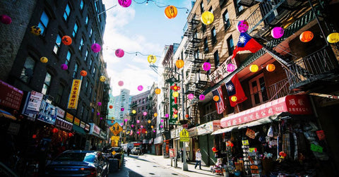 Lanterns strung along Mott Street in NYC Chinatown to remind people that Chinatown is open for business.
