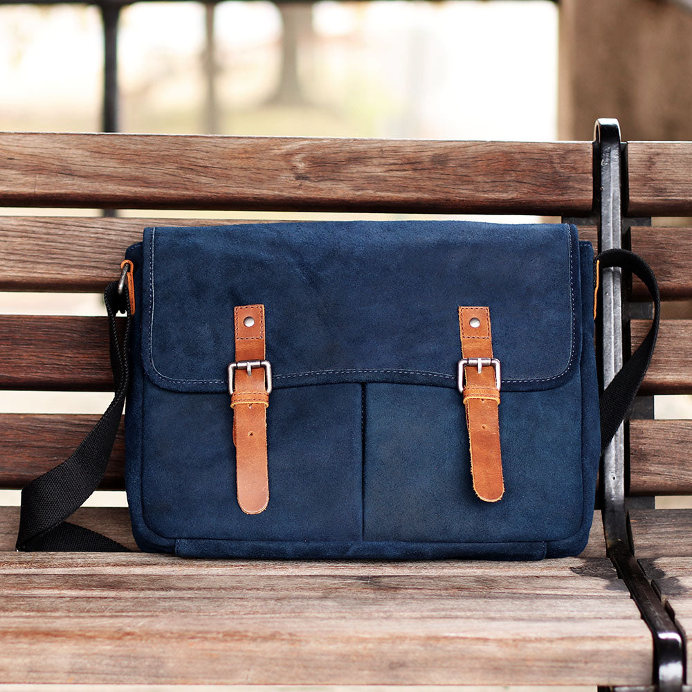 blue leather messenger bag