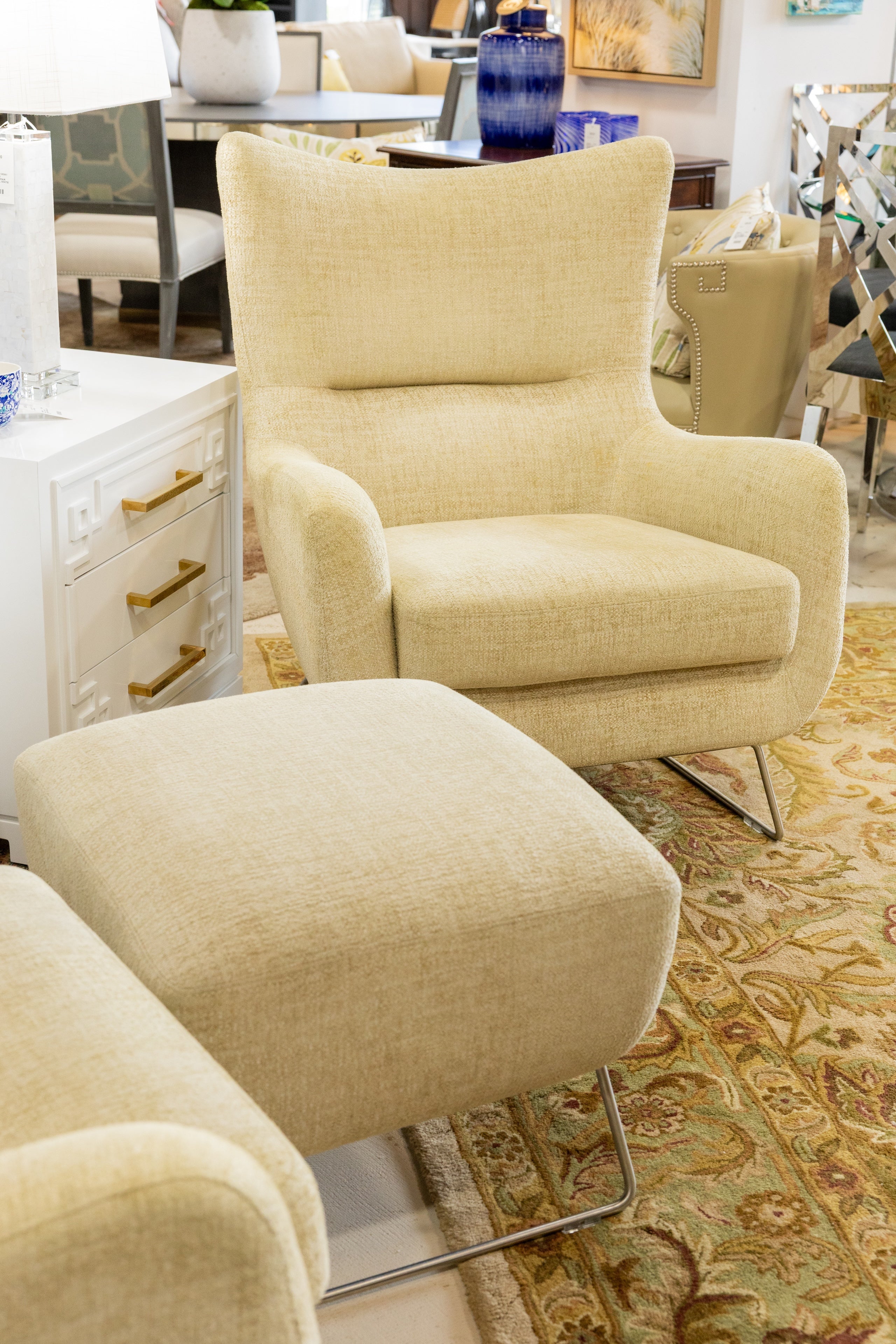 Butter yellow arm chair at the Palm Beach Gardens consignment furniture showroom of Consign & Design.