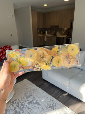 Abby's pressed flower resin display tray from Amelia's wedding.
