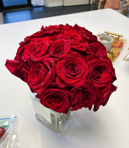 Monofloral ball bouquet with red roses.