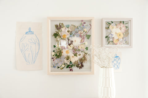 Memorable Moments frame next to a custom pressed flower frame.