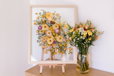 Side by side of a wildflower bouquet fresh and pressed into a 16x20 Natural Wood Frame.