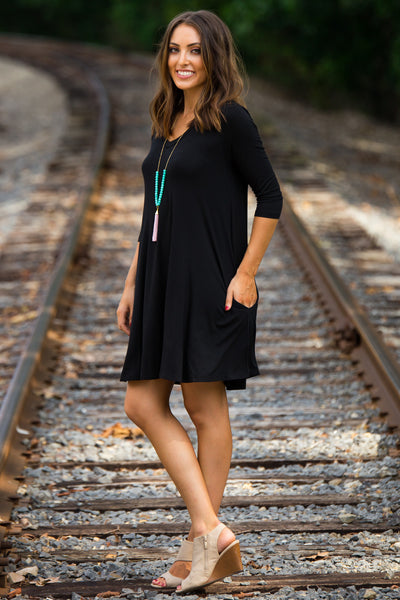 black v neck swing dress