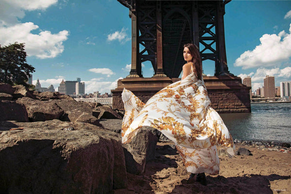 Gabby Westbrook models a Grecian inspired Chanel dress from their 2018 resort collection