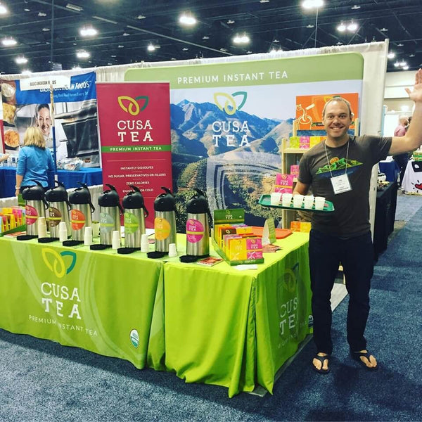 cusa tea trade show booth concept