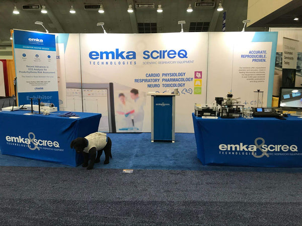 emka trade show booth with expansive backdrop banner