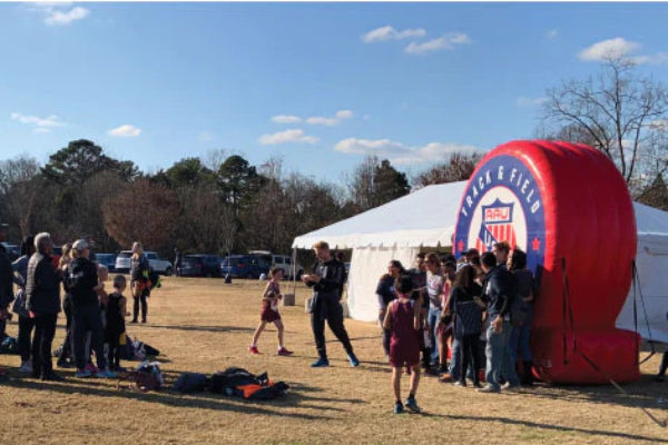 custom inflatable at outdoor event serving as photo backdrop