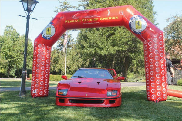 Ferrari under custom inflatable archway