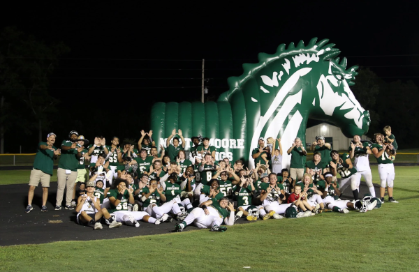 green and white custom inflatable mascot tunnel