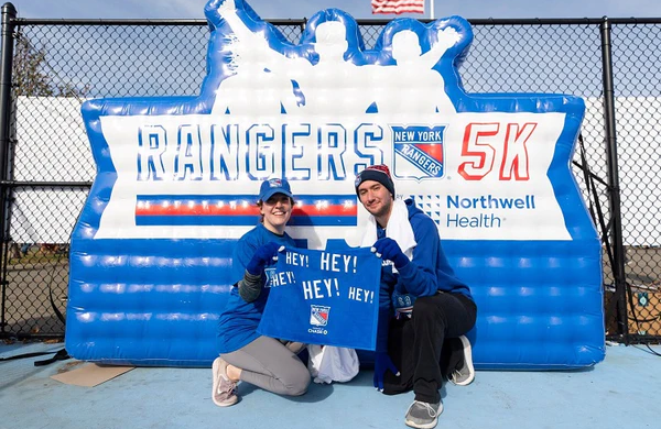 blue and white custom inflatable backdrop at run