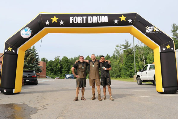 yellow and black branded inflatable archway