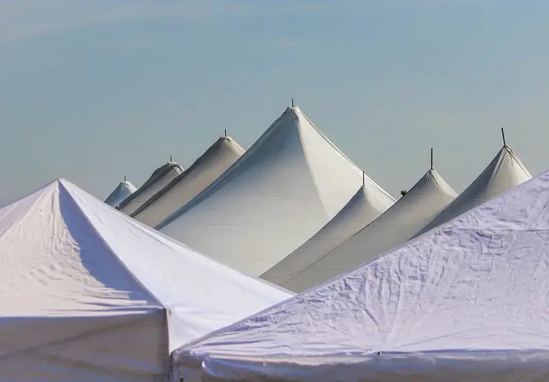 stacks of sailcloth canopy tent roof