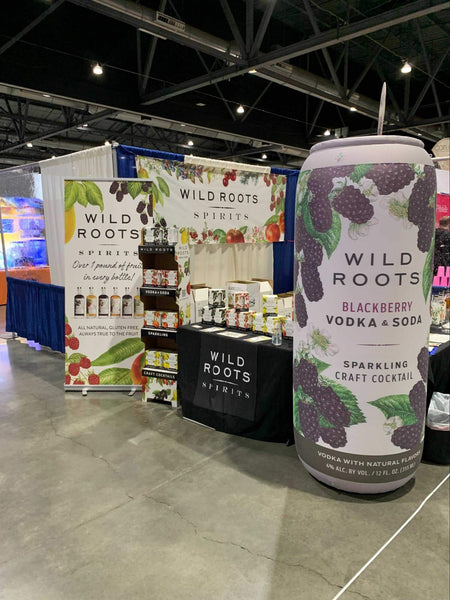 Wild Roots spirits vendor trade show booth idea