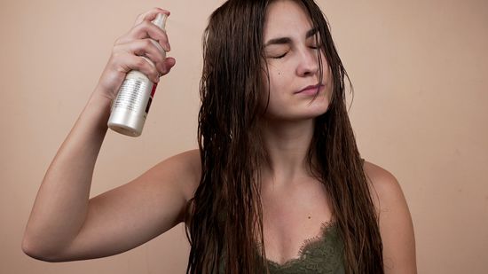 apply heat protectant spray on hair