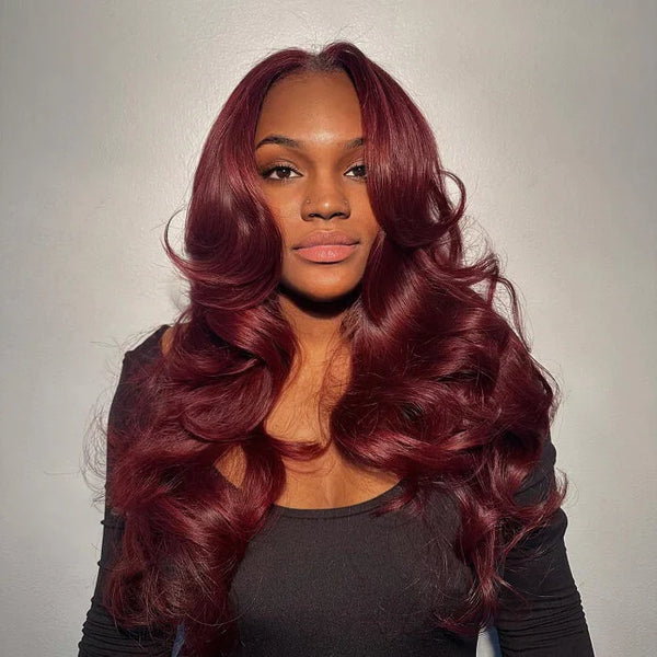 burgundy hair with curtain bangs