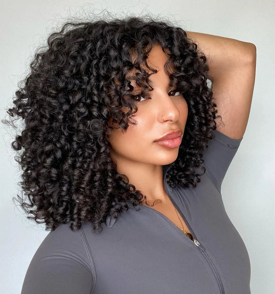 curly hair with curtain bangs