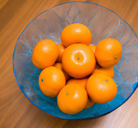 https://cdn.shopify.com/s/files/1/0250/3894/6349/files/1.5.6_citrus_extracts_mandarin_oranges_in_blue_bowl_480x480.jpg?v=1684575312