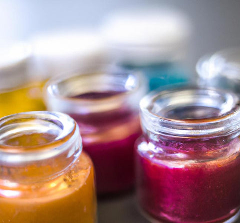 artificial food coloring in short glass containers - Culinary Solvent