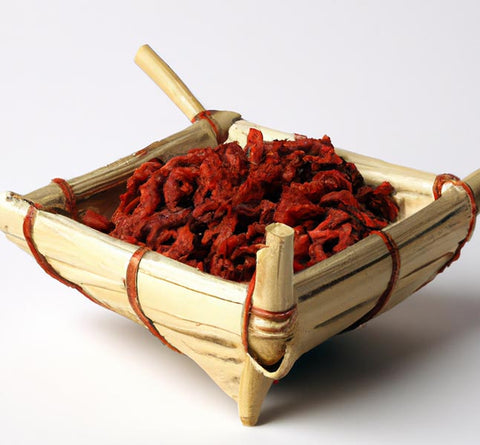 herbalists apothecary goji berries in basket - Culinary Solvent