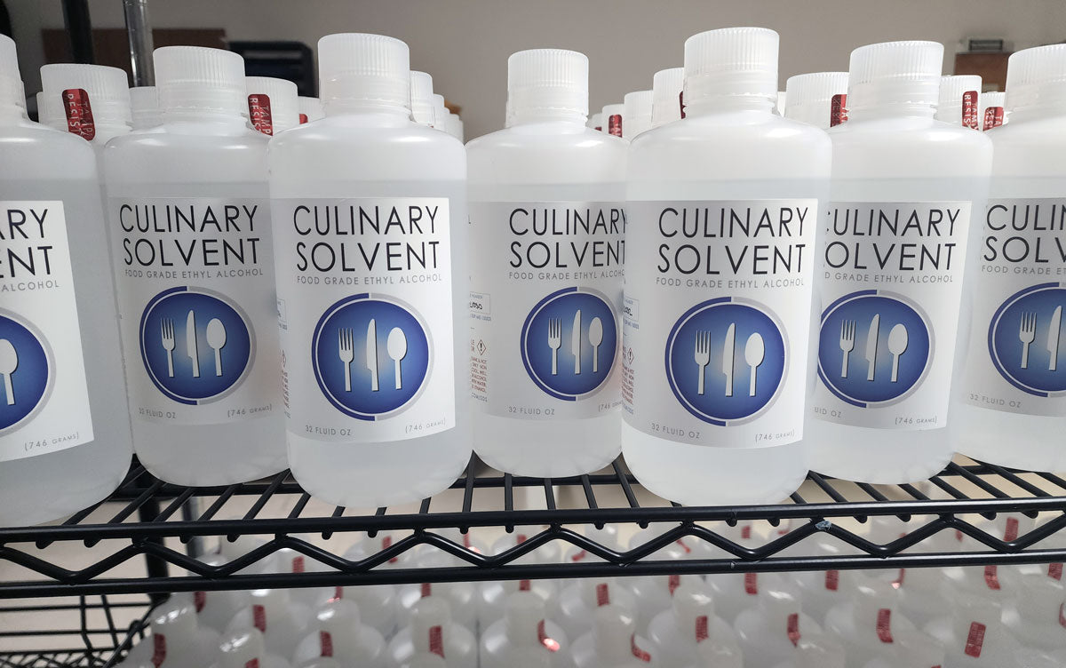 Fill level example bottles of culinary solvent