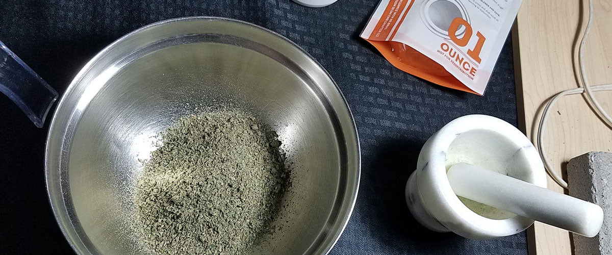 cannabis ground with a mortar and pestle before made into an alcohol tincture