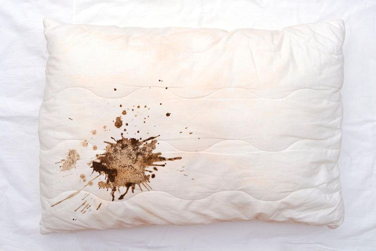 White bamboo pillow case with large coffee stain