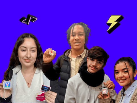 Four high school students hold their imagi charms proudly against a blue background.