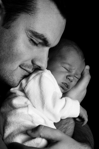 Dad Hugging Infant