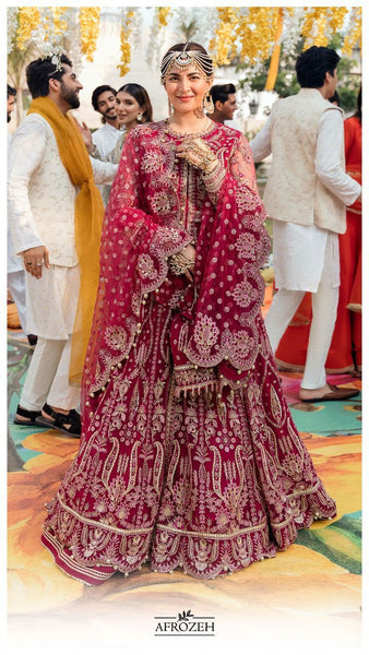 <img src="https://cdn.shopify.com/s/files/1/0250/6109/7575/files/2ED57744-55E7-4CEB-9A69-30383871289C_480x480.jpg?v=1663424612" alt="Afrozeh Wedding Formals 2022/23 Pakistani Designer Wedding Dresses for Indian Pakistani women in UK USA And France" />
