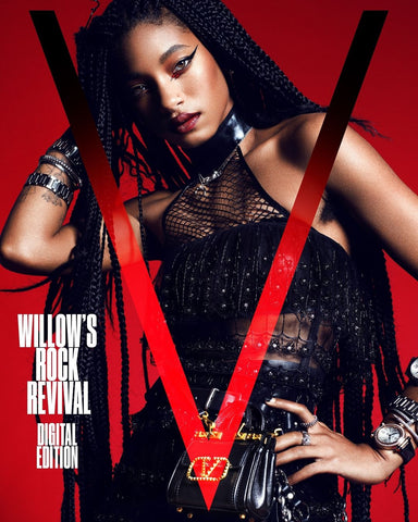 Willow Smith on the cover of V Magazine wearing Vex black fishnet crop top posing against a red background for a rocker look