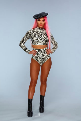 Woman wearing Vex's leopard print long sleeve crop top, matching knicker with black boots, beret and long pink hair