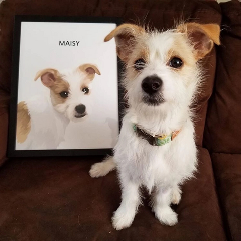  A puppy on a couch next to its painting 