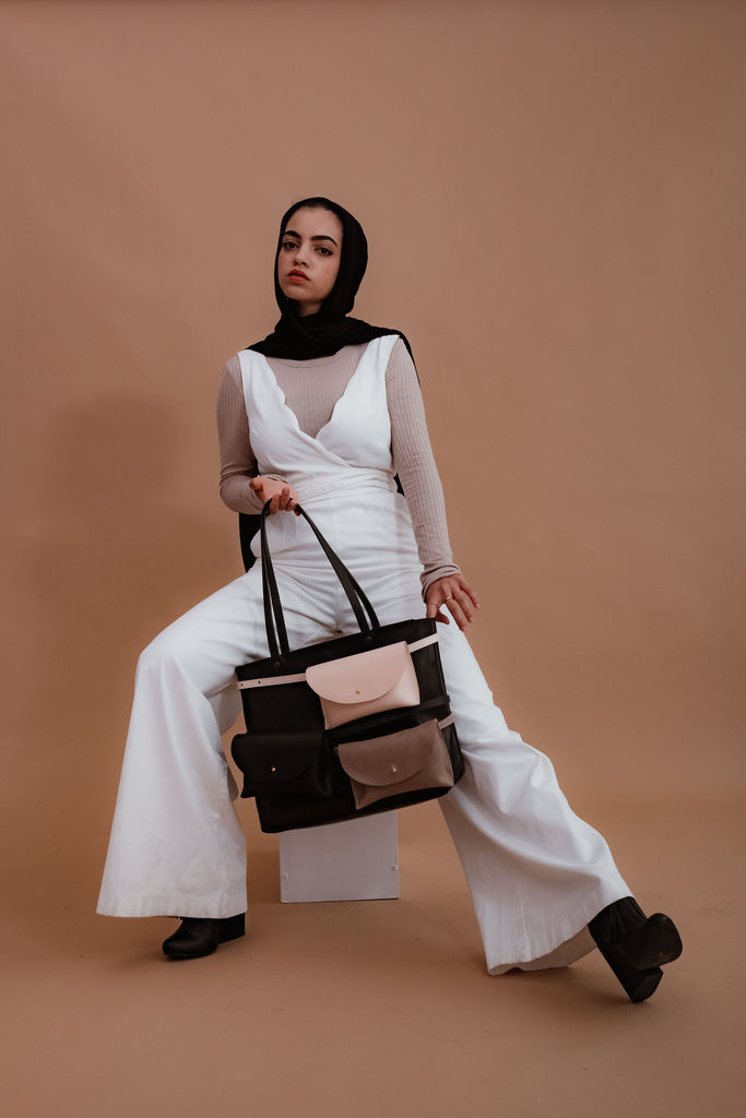 female model with leather bags