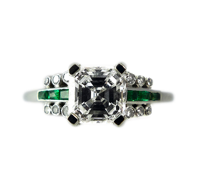 This exquisite Hardy Bros. piece from the Art Deco era showcases a stunning 1.22ct Asscher cut diamond with D color and VVS1 clarity