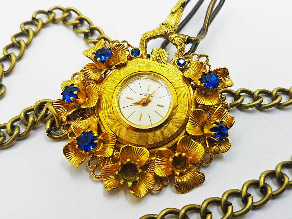 Maty Gold Floral Pocket reloj | Medalión reloj
