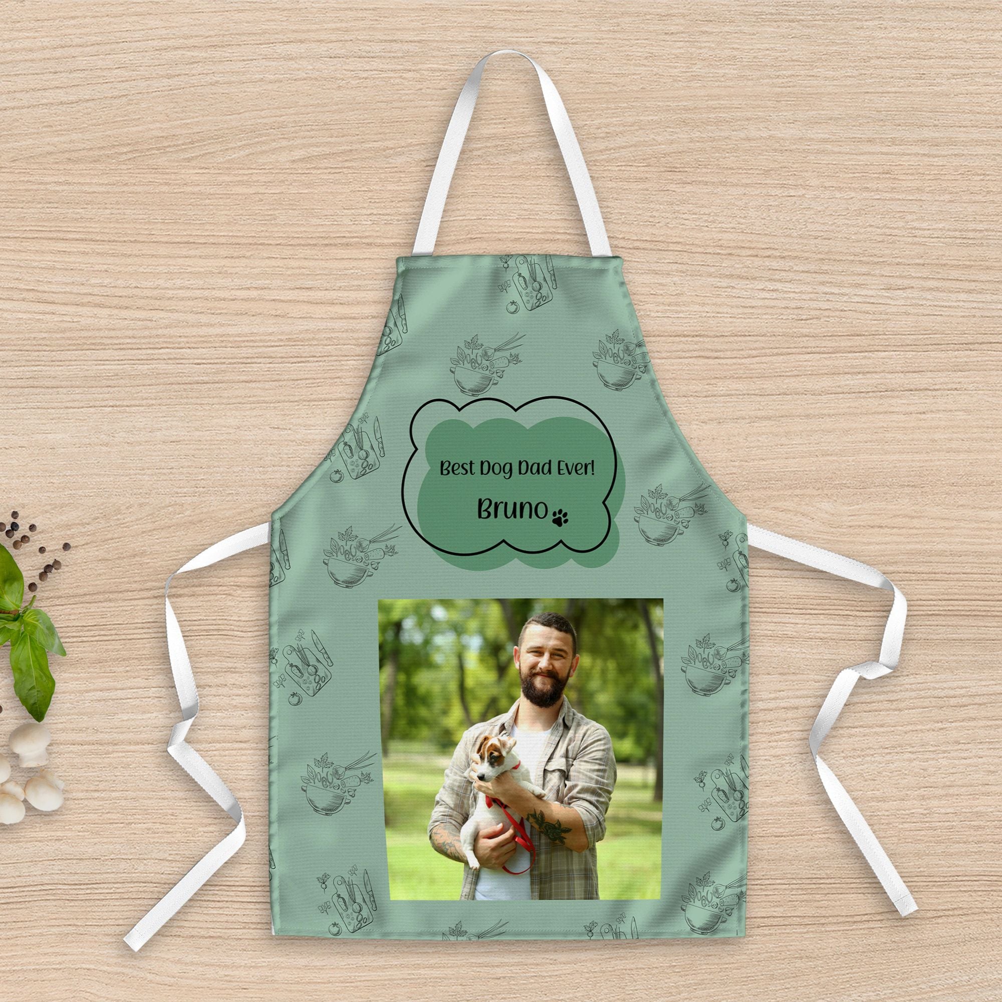 https://cdn.shopify.com/s/files/1/0250/7790/7522/products/personalised-apron-best-dog-dad-ever-221461.jpg?v=1691860636