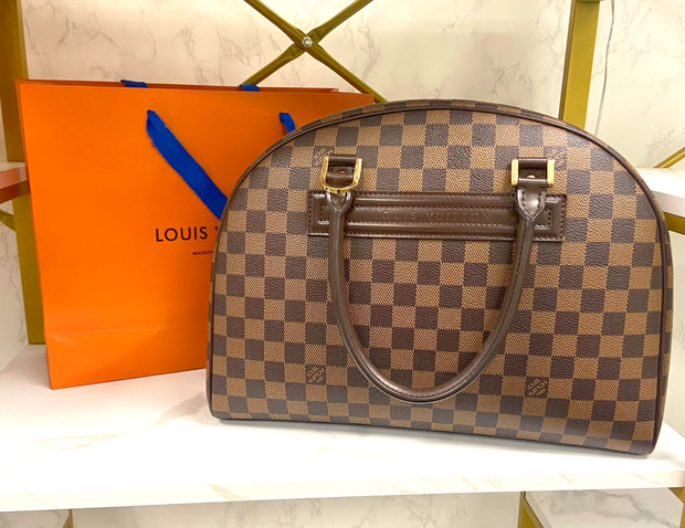 Louis Vuitton Dune Epi Leather Clery Pochette Bag Louis Vuitton | The  Luxury Closet