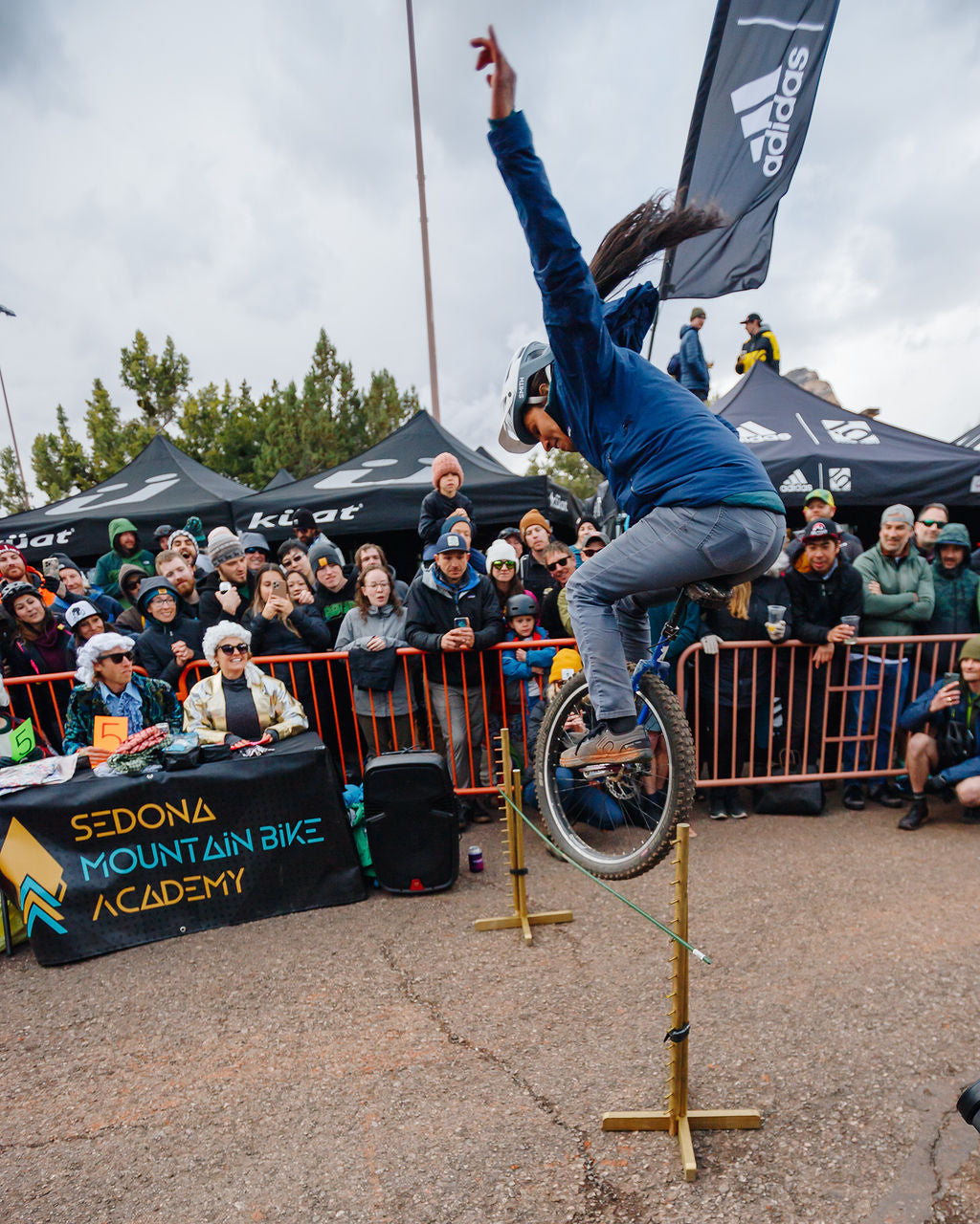 A unicycle rider competing in the Sedona Mountain Bike Festival Bunny Hop Challenge.