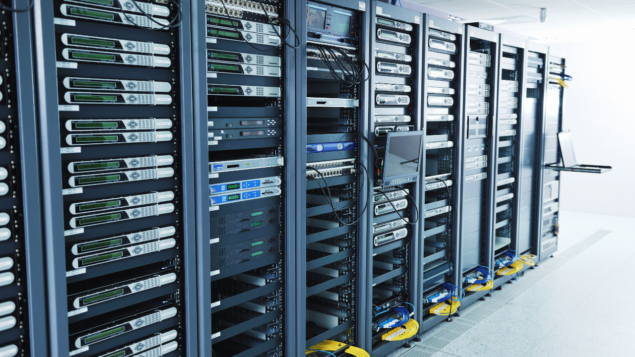 Wall of servers with laptops attached for maintenance