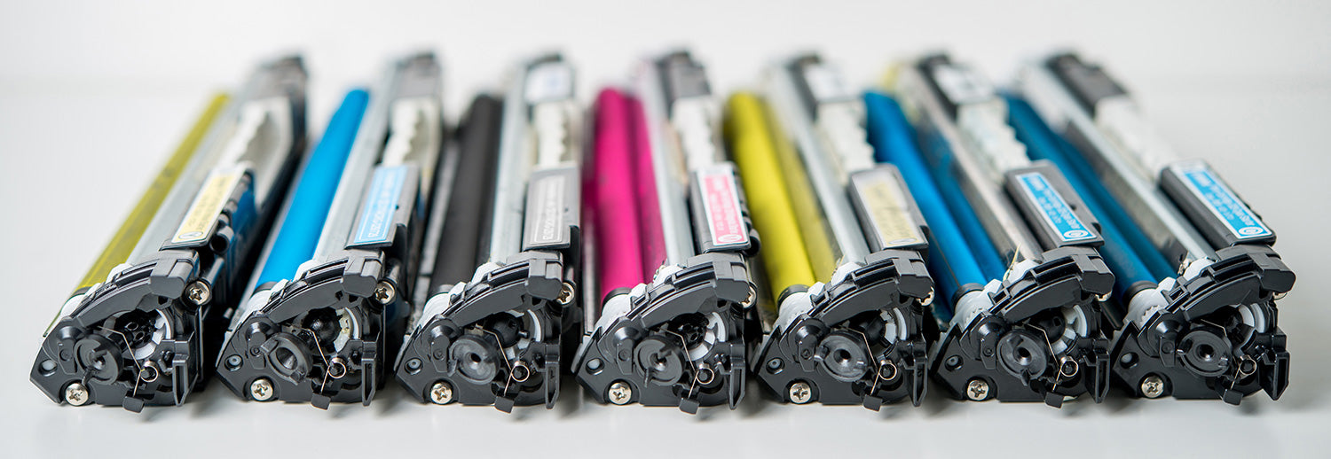 Toner of all colours laid out in a row - Carlyle Printer, Services, and Supplies LTD. Toner Supplies